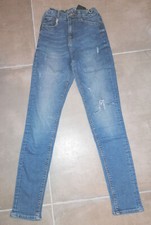 Jean slim à trous femme