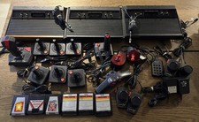 Lot Atari 2600 SECAM 3 consoles 14 manettes 6 jeux en l’état