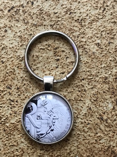 Porte clé médaillon - porte,