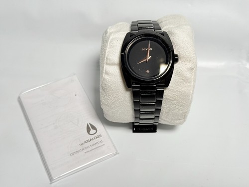 Nixon wristwatch like a - “like,