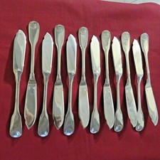 Christofle 12 couteaux à poisson en métal argenté modèle coquille Vendôme 6