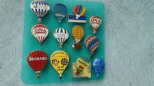 lot de 12 pin's montgolfières - lausanne /ptt - DNA - suchard - sony - etc.