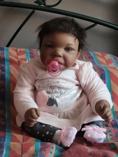Adorable bébé reborn fille Metissée