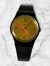 Montre femme "Swatch LADY LB187" Noir & Or