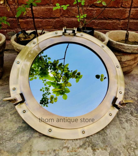 Ancien miroir hublot laiton