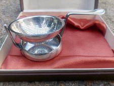 Passe thé à bascule