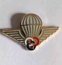 Pin's Réduction Insigne