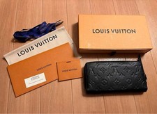 Portefeuille long Louis Vuitton en cuir noir pour hommes portefeuille à deux ...