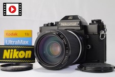 ⏯ Reflex 35 mm Nikon Nikomat EL noir avec objectif zoom-Nikkor 43-86 mm f/3,5...