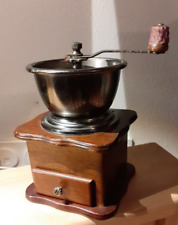 Moulin à café à corolle, Rare. Une roulette peut changer la moulure du grain.