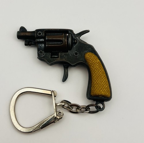 Porte clé pistolet à - -,