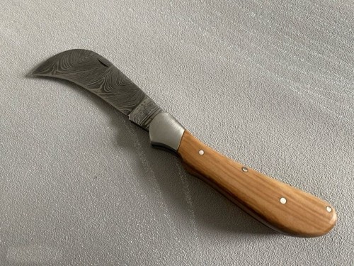 Couteau poche serpette - de,
