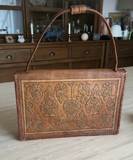 Sac signé cuir estampé