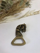 Superbe décapsuleur en bronze