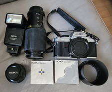 Lot "MINOLTA - X-500", 2x Objectifs, 1x Boitier, 1x Flash, 2x Filtres, etc.