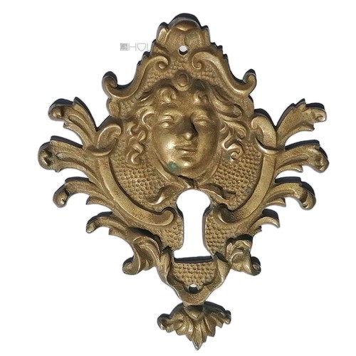 Plaque clef bronze avec - de,
