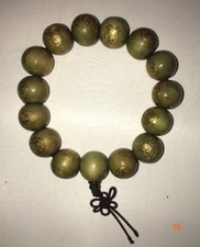 Bracelet en bois mala népal tibétain bouddha protection priere couleur olive