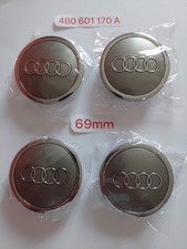 CACHES DE ROUES GRIS ,MOYEUX POUR AUDI 69MM NEUF SOUS BLISTER