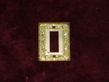 Plaque Enjoliveur métal Doré