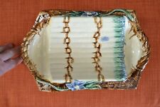 Beau plat à asperges ancien en faïence à motif floral