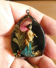 Ancien pendentif résine