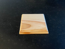 socle en bois brut pour