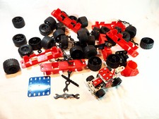 Lot jouets modernes  MECCANO - nombreuses pièces détachées - roues clefs divers