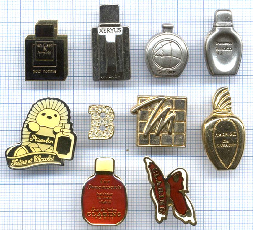 Lot pins parfums clarins - de,