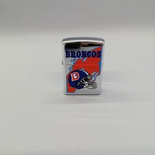 Briquet huile zippo - à,