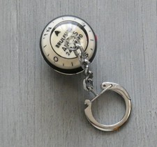 ancien porte clé boule boussole bruleurs Airess années 60