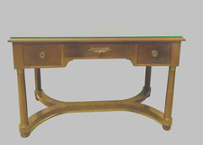 bureau style empire piétement à entretoise dessus cuir à tirettes . XX siècle .