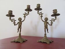 Paire d'anciens chandeliers , bougeoirs 2 feux , chérubin en vis à vis. XIXe .