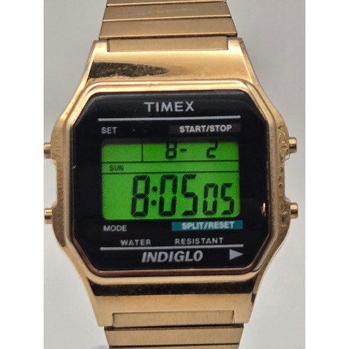 Vintage timex 555 gold tone - gold,