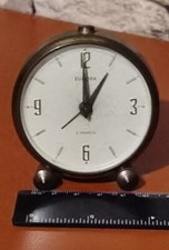 pendule reveil laiton EUROPA 2 JEWELS made GERMANY mécanique , fonctione bien 