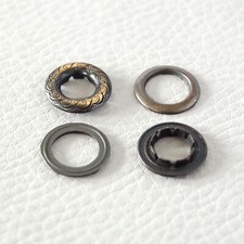 OEILLET METAL GRAVÉ