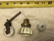 Lot of three salvage hardware items: glass doorknob, porcelain roller, milk knob