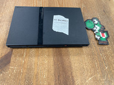 Console PS2 lentille HS vendu pour pièces sans câbles