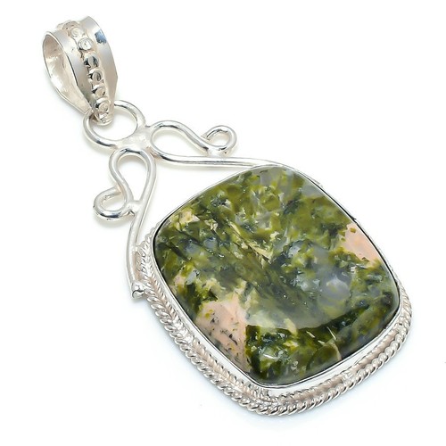 Pendentif bijou ancien fait