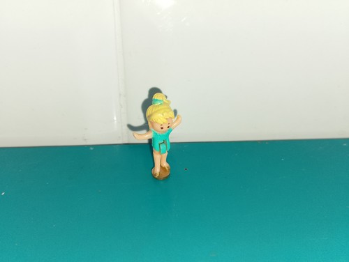 Polly pocket figurine doll