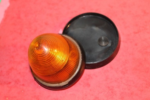 Cabochon plastique orange obus