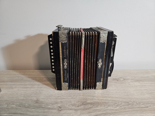 Antique eagle brand accordian - antique,