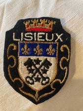 Ancien écusson à coudre feutre brodé blason Lisieux  neuf  Vintage patch tbe