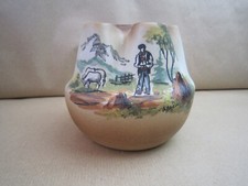 PIQUE FLEURS EN GRES SIGNE