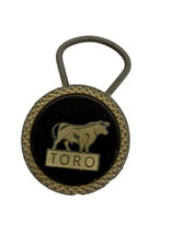 Porte-clés vintage Toro Bull - rare objet de collection noir et or sur le thè...