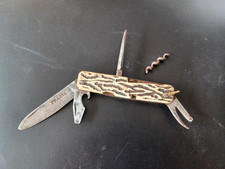 ANCIEN COUTEAU PRADEL BOIS DE CERF  MULTIFONCTIONS DONT UNE CASSEE