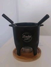 Service à fondue à la bougie