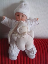 POUPEE  BB COROLLE BONNET BLANC +DOUDOU
