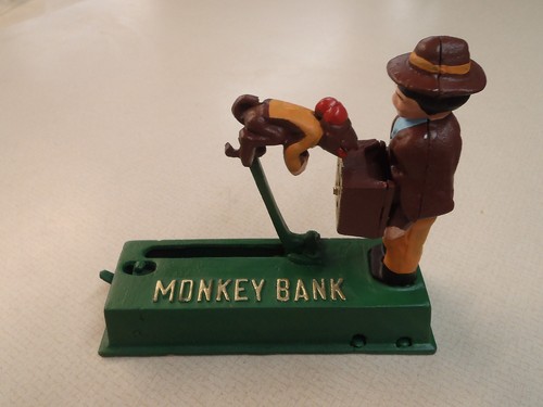 Vintage cast iron monkey bank - cast,