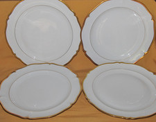 Série de 4 assiettes plates porcelaine limoges blanche filets or