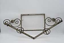 Ancien porte Manteau en métal cadre photo